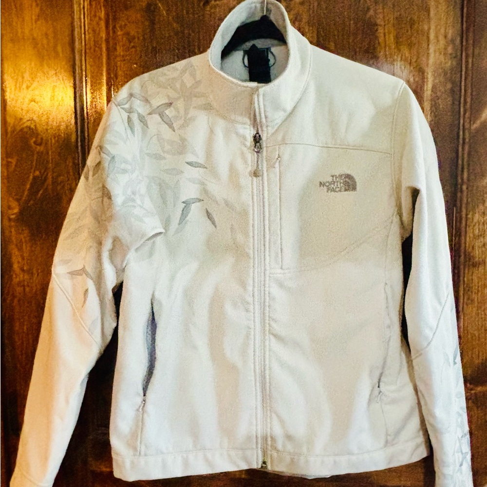 The North Face Women's white APEX  Jacket with Leaf Design
